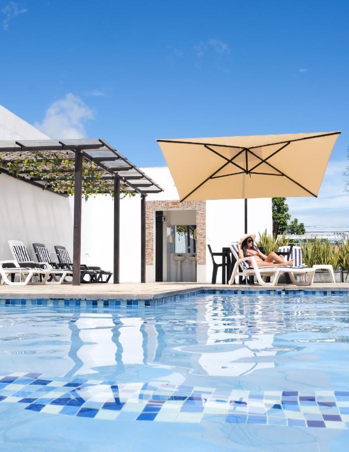 Hotel Bella Isa ลา โดราดา ภายนอก รูปภาพ