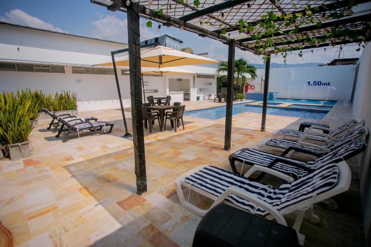 Hotel Bella Isa ลา โดราดา ภายนอก รูปภาพ